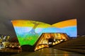 Night photography of colorful illuminated light on Opera House is a multi-venue performing arts centre in New South Wales.